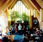 AT addresses his congregation.